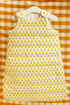 Gigoteuse au motif Flower de la capsule bébé naissance Baby Care suspendue par un ceintre.